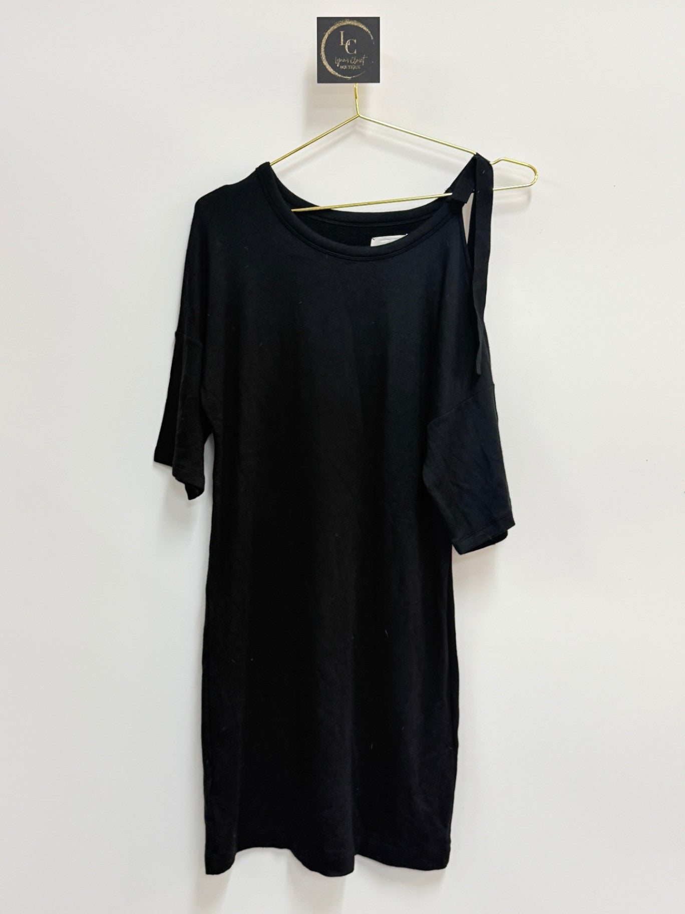 Lynn's Closet Boutique Lou & Grey black casual dress with an asymmetrical off-the-shoulder strap, size XS.