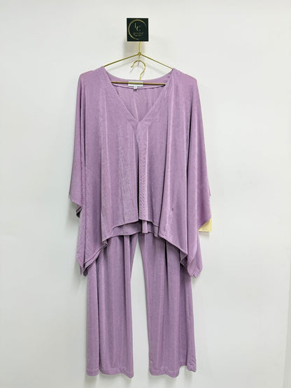 Lynn's Closet Boutique Ripley Rader lilac 2-piece pant set with V-neck flowy top and wide-leg trousers.