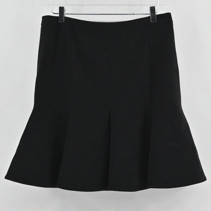 Lynn's Closet Boutique Akris Punto black skater skirt with a flared godet hemline hanging on a hanger