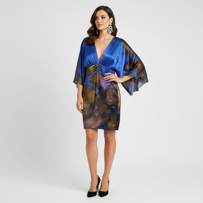 Model wearing a Lynn's Closet Boutique Y2K Alberto Makali blue silk dress with kimono sleeves and beaded waist detail.