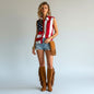 Lynn's Closet Boutique Scully American flag print sleeveless button-up shirt with denim shorts and fringe boots.