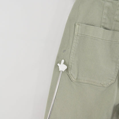 Lynn's Closet Boutique Anthropologie Maeve Colette moss green pants showing a small discoloration spot on the pocket