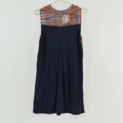 Lynn's Closet Boutique Anthropologie shift dress featuring a navy back panel with a subtle pleat and sunburst print