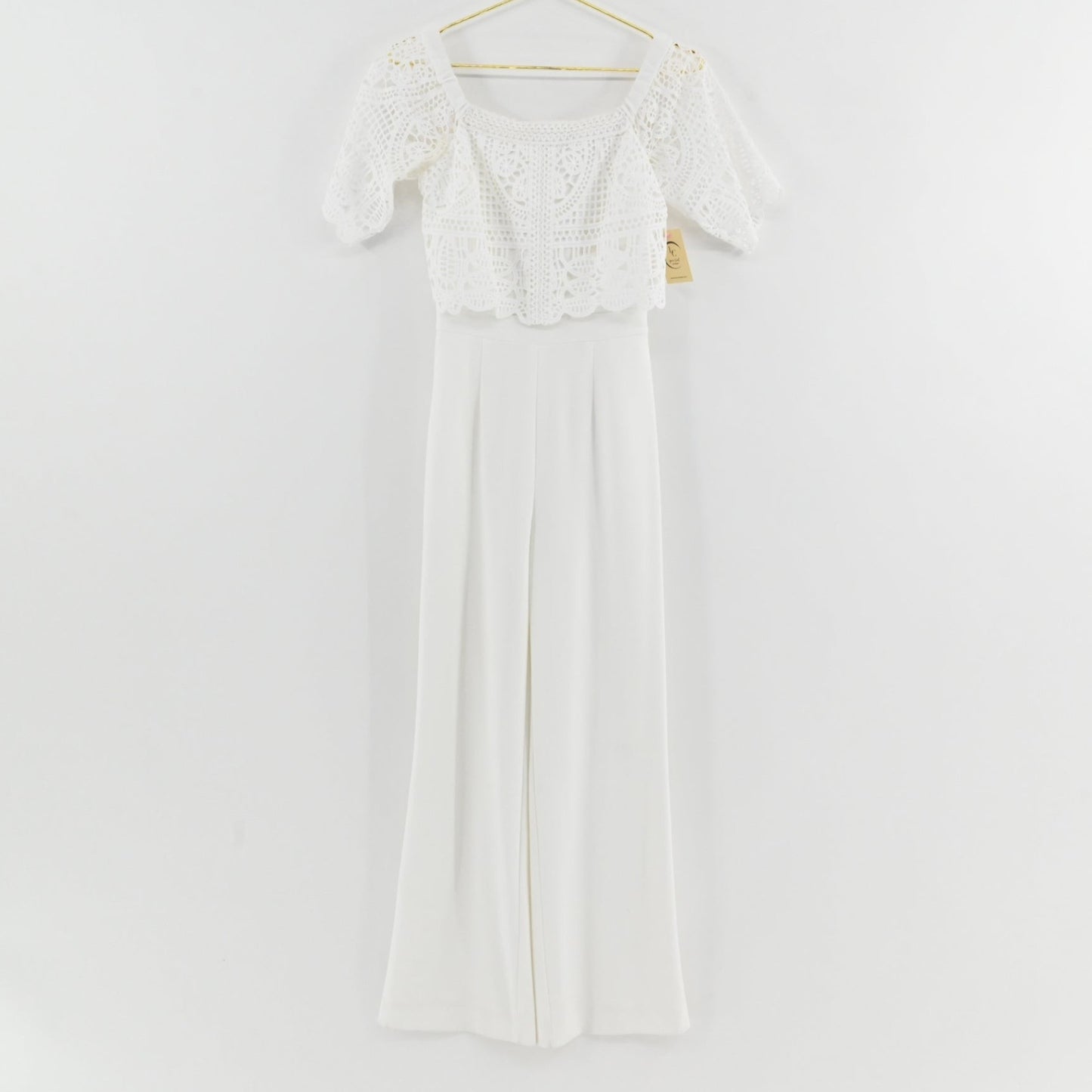 Lynn's Closet Boutique Antonio Melani white wide-leg jumpsuit with off-the-shoulder crochet lace bodice