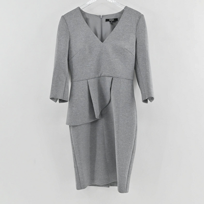 Lynn's Closet Boutique Badgley Mischka heather grey scuba sheath dress with V-neck, 3/4 sleeves, and peplum waist.