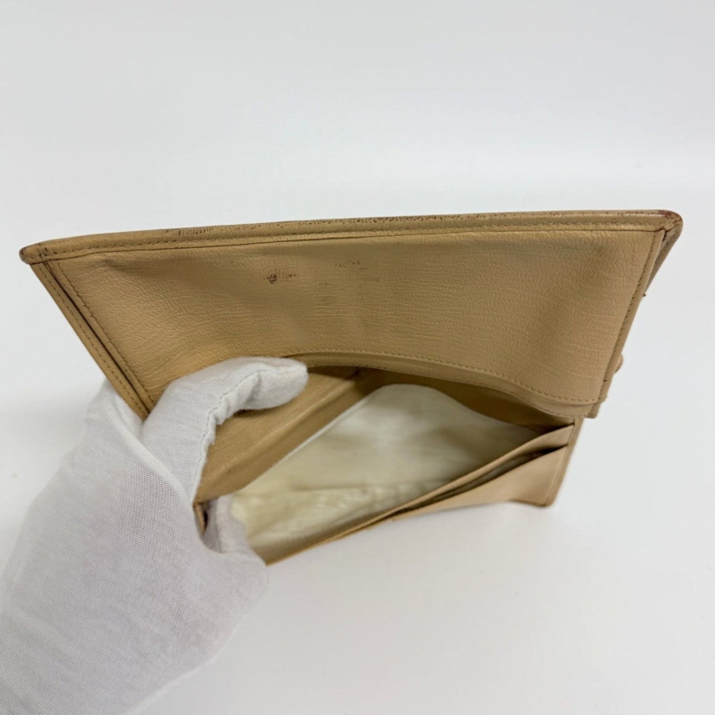 Lynn's Closet Boutique pre-owned beige leather Chanel bi-fold wallet interior view showing card slots and lining