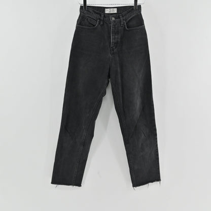 Lynn's Closet Boutique Free People high-rise straight-leg jeans in a black wash with a button-fly and raw frayed hem.