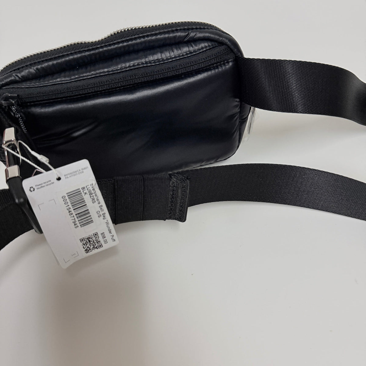Lynn's Closet Boutique Lululemon Everywhere Belt Bag in black puffer material with adjustable strap and product tag