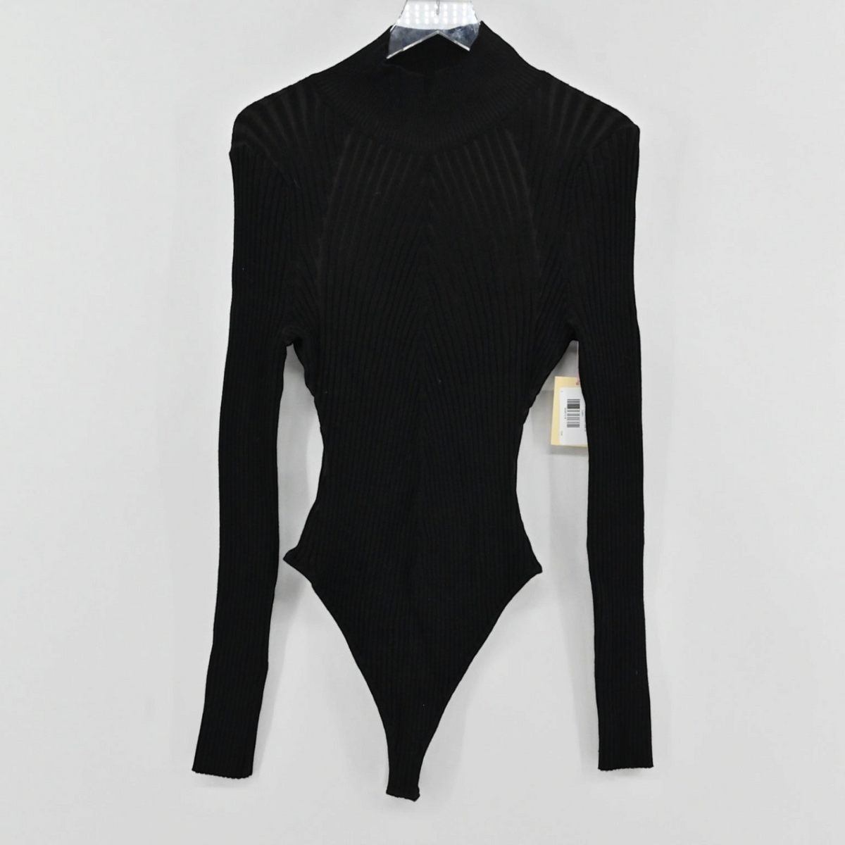 Lynn's Closet Boutique black ribbed sweater bodysuit with a mock neck and long sleeves on a hanger.