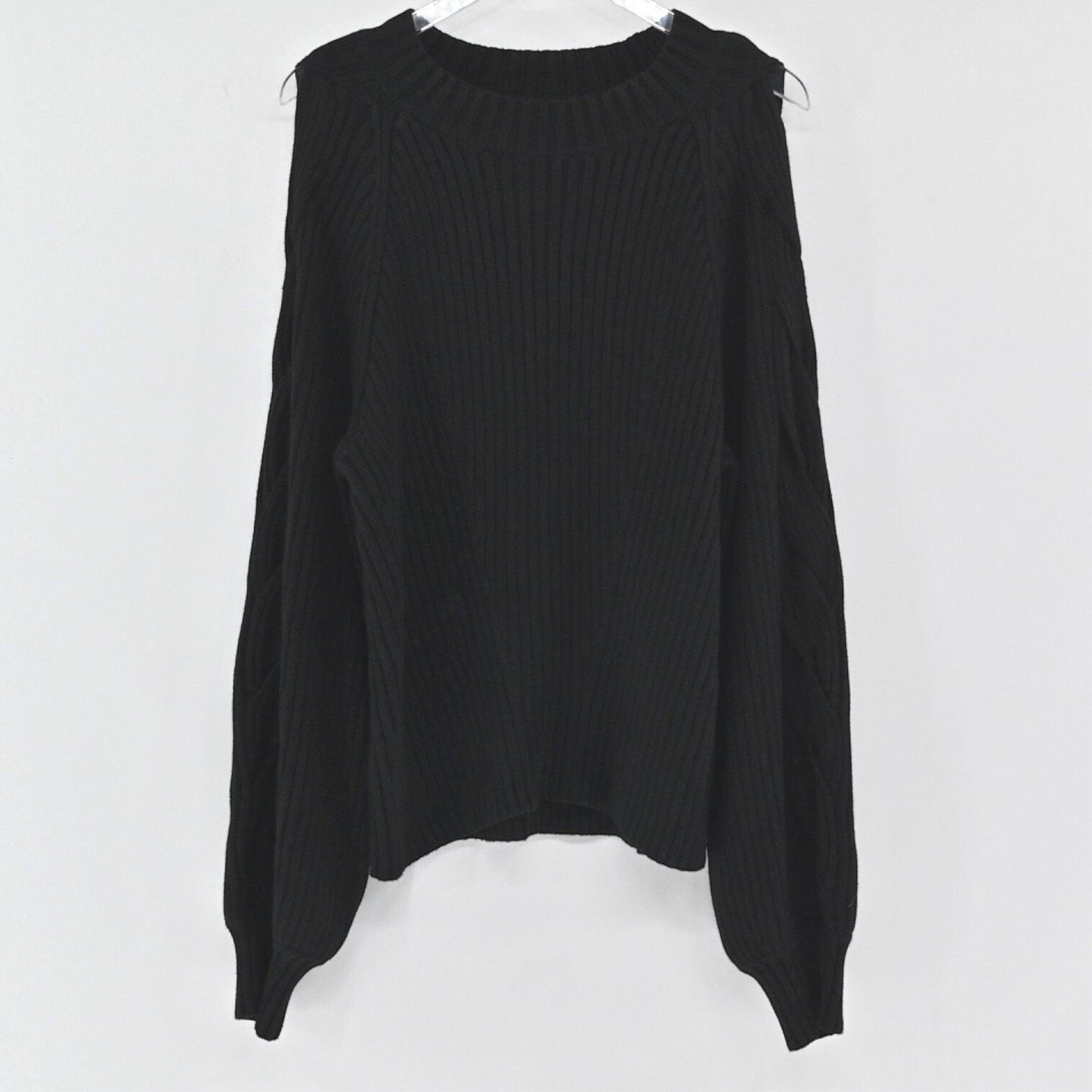 Lynn's Closet Boutique 525 America black ribbed sweater with cold shoulder cutouts and long sleeves.