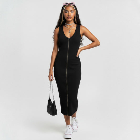 Model wearing a black ribbed AllSaints Alicia midi dress with a front zipper from Lynn's Closet Boutique