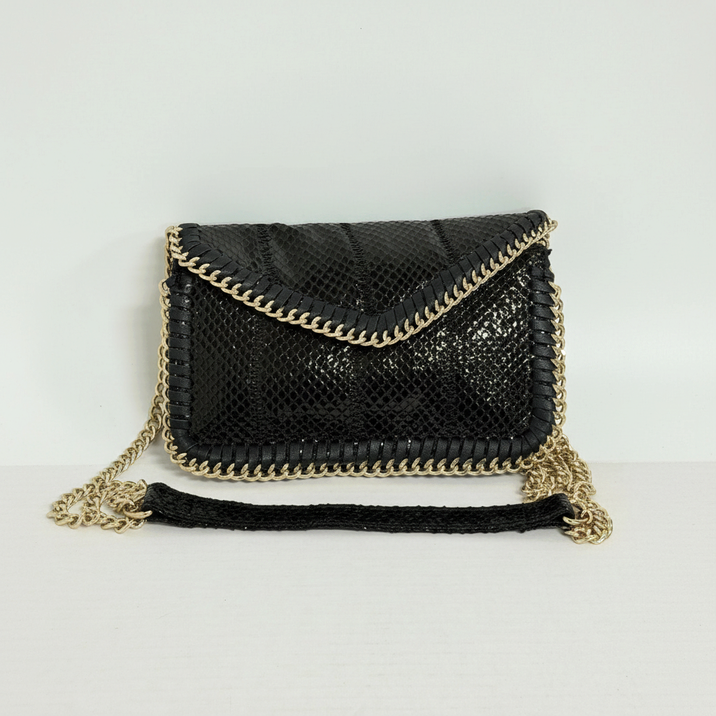 Lynn's Closet Boutique Sondra Roberts black snakeskin-embossed clutch with gold-tone chain trim and shoulder strap.