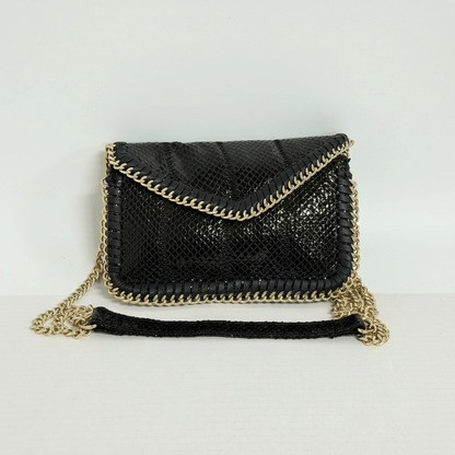 Lynn's Closet Boutique Sondra Roberts black snakeskin-embossed clutch with gold-tone chain trim and shoulder strap.