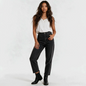 Model wearing Lynn's Closet Boutique black wash high-rise straight-leg jeans with a button fly and raw frayed hem