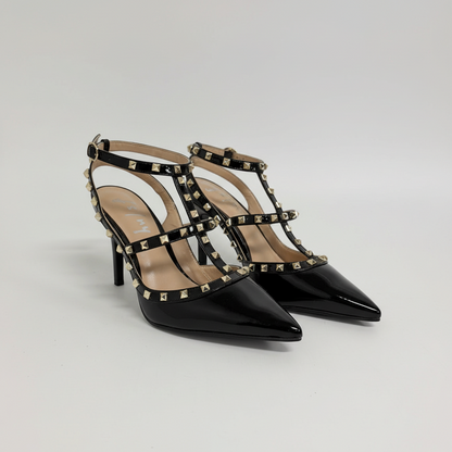 Lynn's Closet Boutique black patent pointed-toe heels with gold pyramid studs and multi-strap cage design.