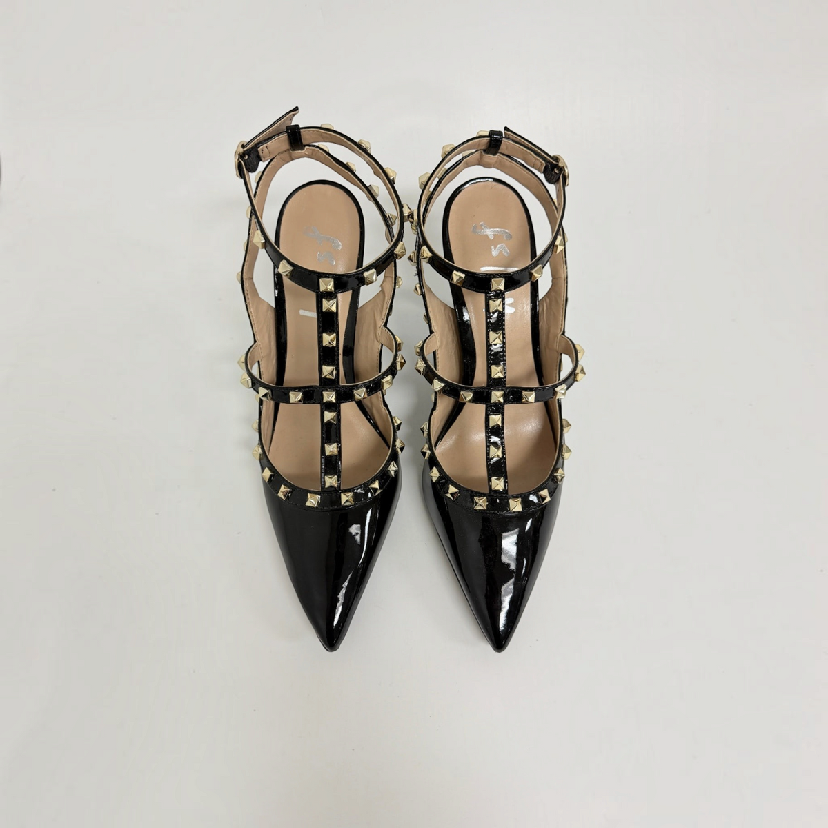 Lynn's Closet Boutique FS/NY black patent pointed-toe heels with gold pyramid studs and cage strap design