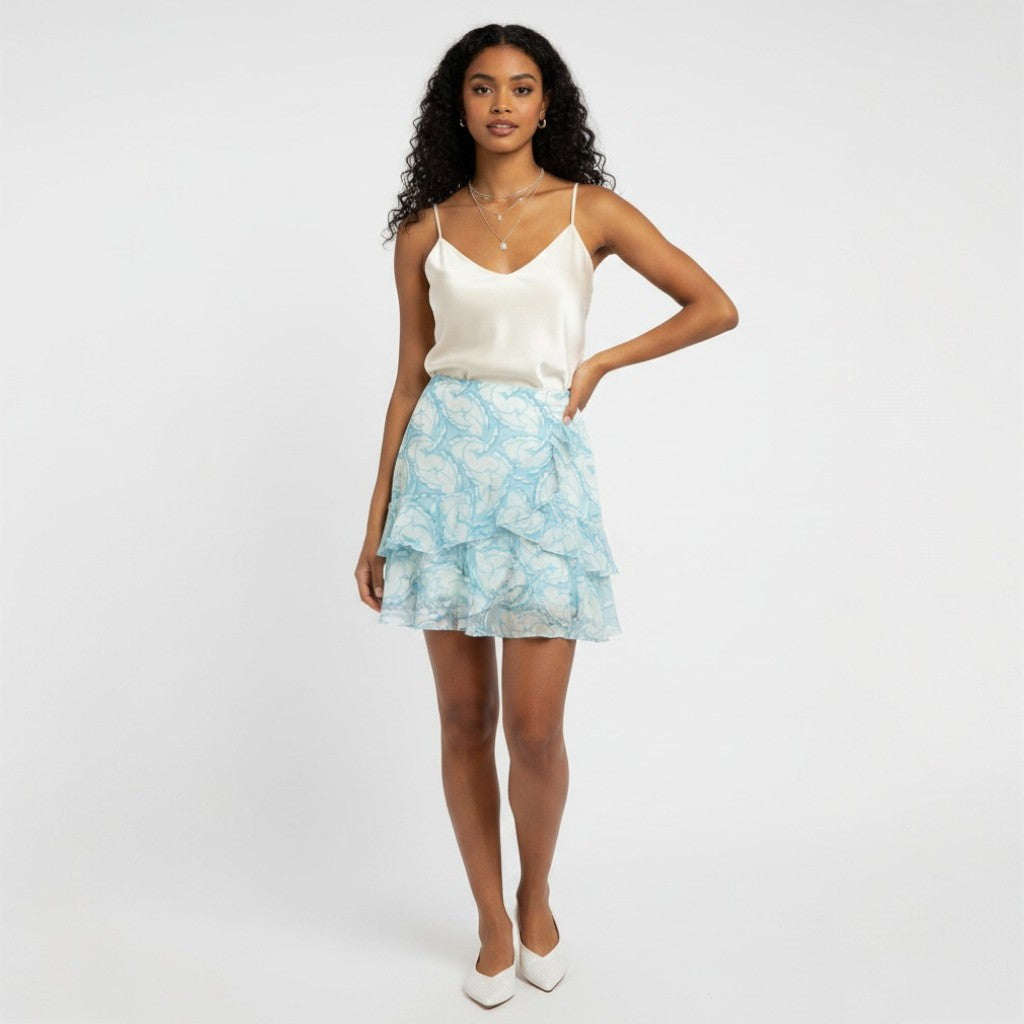 Lynn's Closet Boutique blue and white floral print midi skirt with tiered ruffles, size 6.