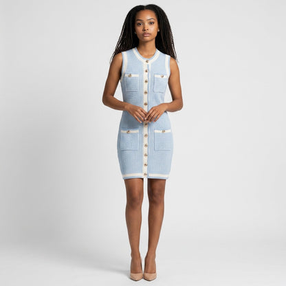 Model wearing a Lynn's Closet Boutique baby blue textured knit sleeveless dress with cream trim and gold buttons