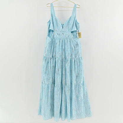 Lynn's Closet Boutique sky blue metallic maxi dress with V-neck, side cut-outs, and tiered skirt on a hanger.