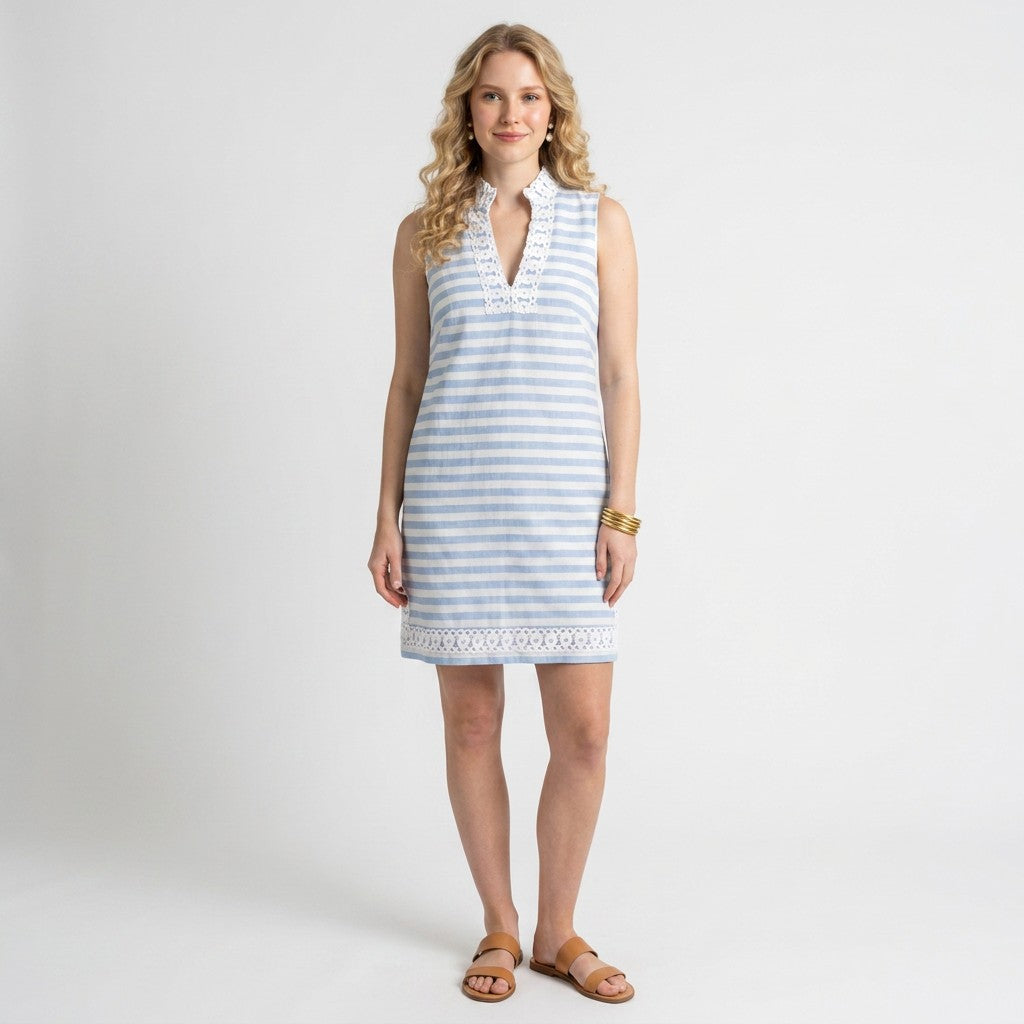 Model wearing a Lynn's Closet Boutique blue and white striped sleeveless dress with lace trim detail