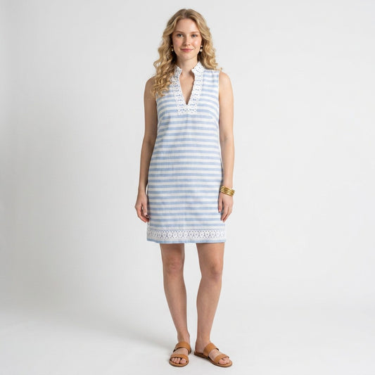 Model wearing a Lynn's Closet Boutique blue and white striped sleeveless dress with lace trim detail