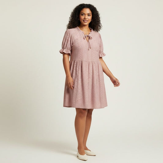 Lynn's Closet Boutique blush pink eyelet dress with ruffle neckline, tie front, and puffed sleeves. Size 2X.