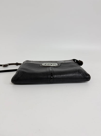 Lynn's Closet Boutique Brighton crossbody bag in black and brown textured leather with a silver-tone metal emblem.