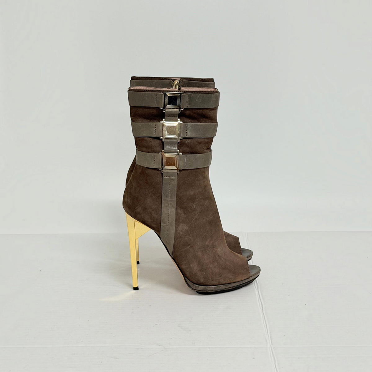 Lynn's Closet Boutique brown suede Herve Leger peep-toe boots with metallic gold stiletto heels and strap hardware.