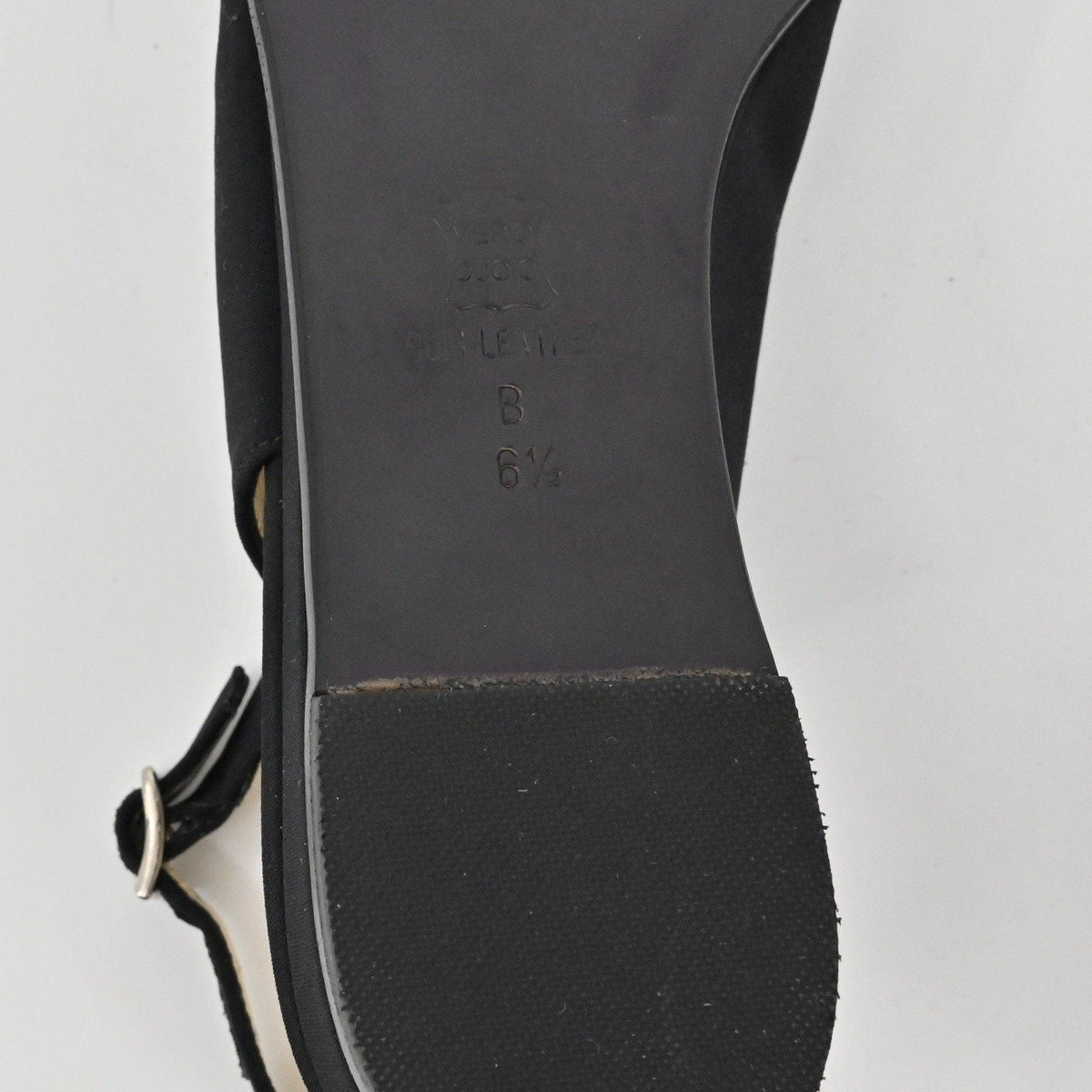 Lynn's Closet Boutique Bruno Magli black leather slingback flat sole showing size 6.5B and Italian leather stamp