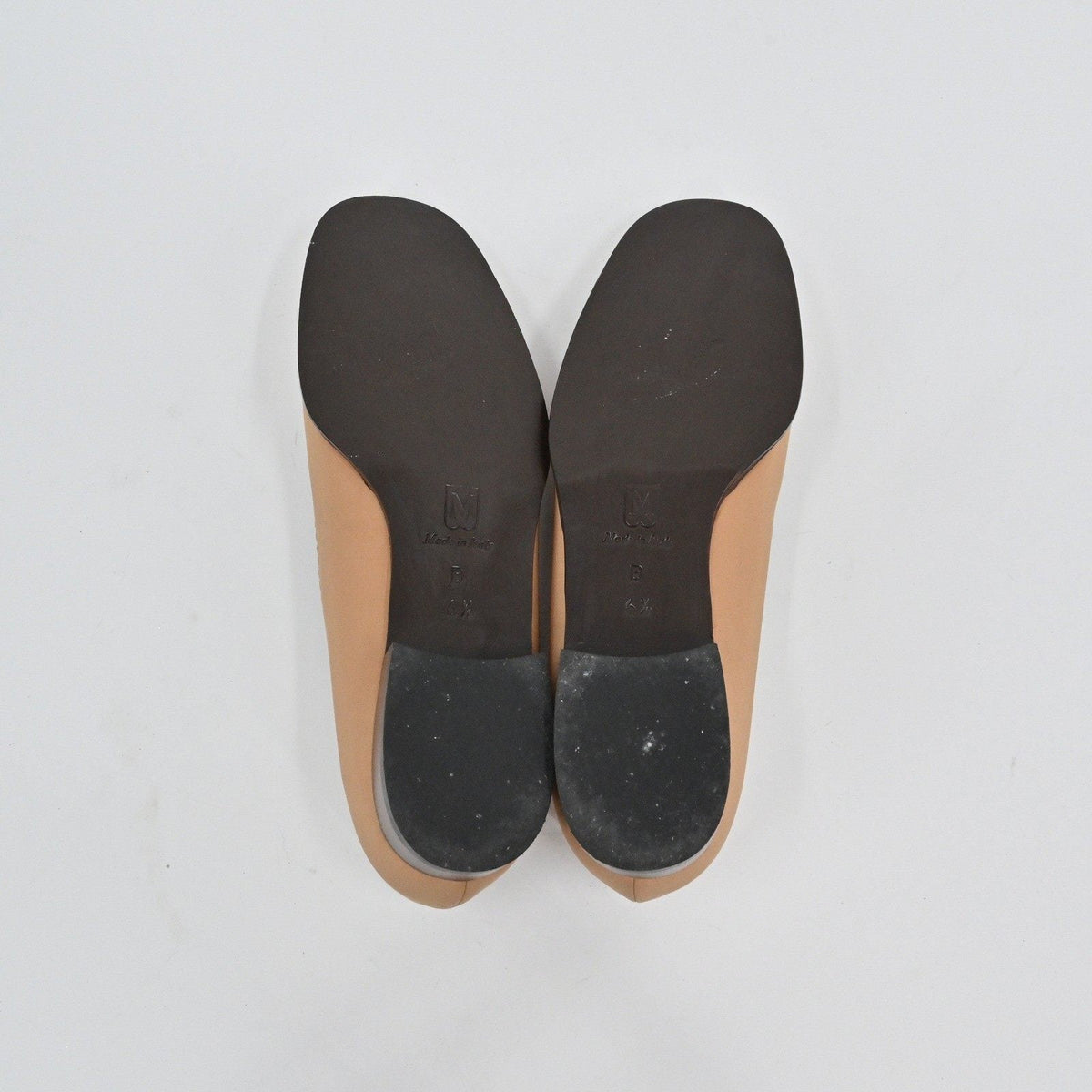 Lynn's Closet Boutique Bruno Magli tan leather loafer pumps showing the dark brown soles and low heels