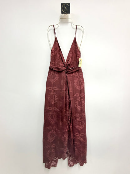 Lynn's Closet Boutique burgundy silk maxi dress with plunging V-neck, front-twist detail, and tonal jacquard pattern.
