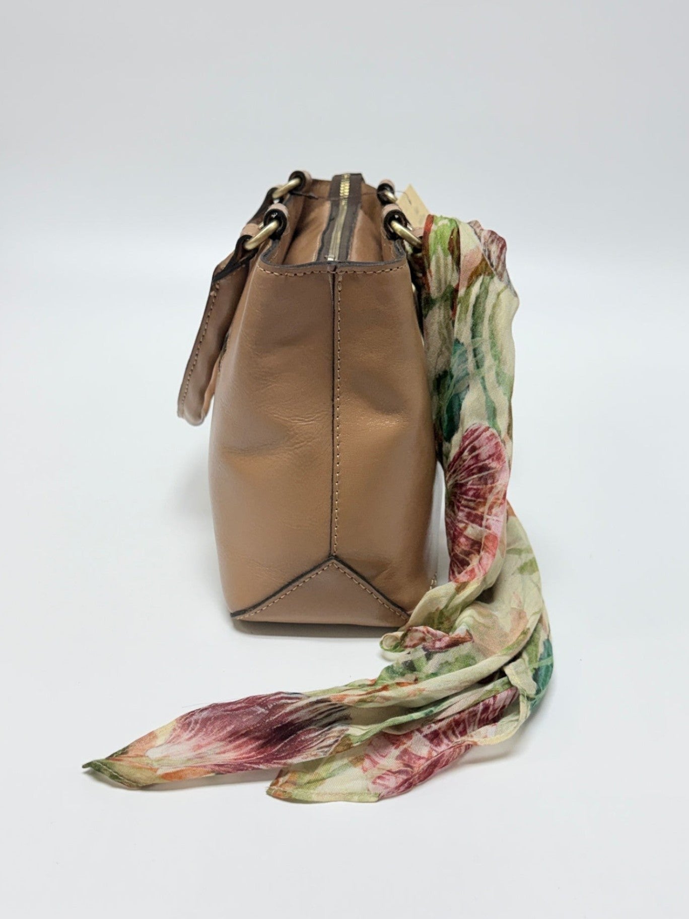 Lynn's Closet Boutique Patricia Nash Angela satchel in camel leather, side view with a floral printed scarf attached.