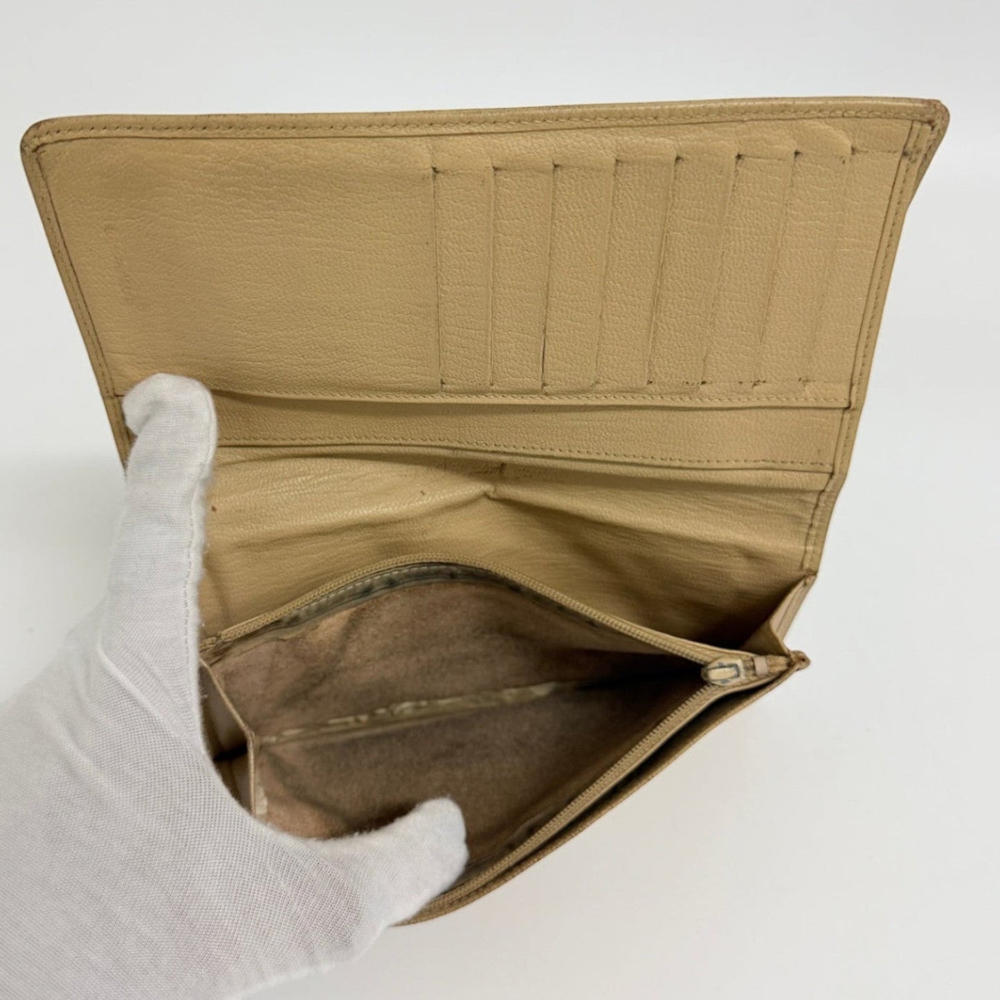 Lynn's Closet Boutique pre-owned beige leather Chanel bi-fold wallet interior with card slots and zippered coin pouch
