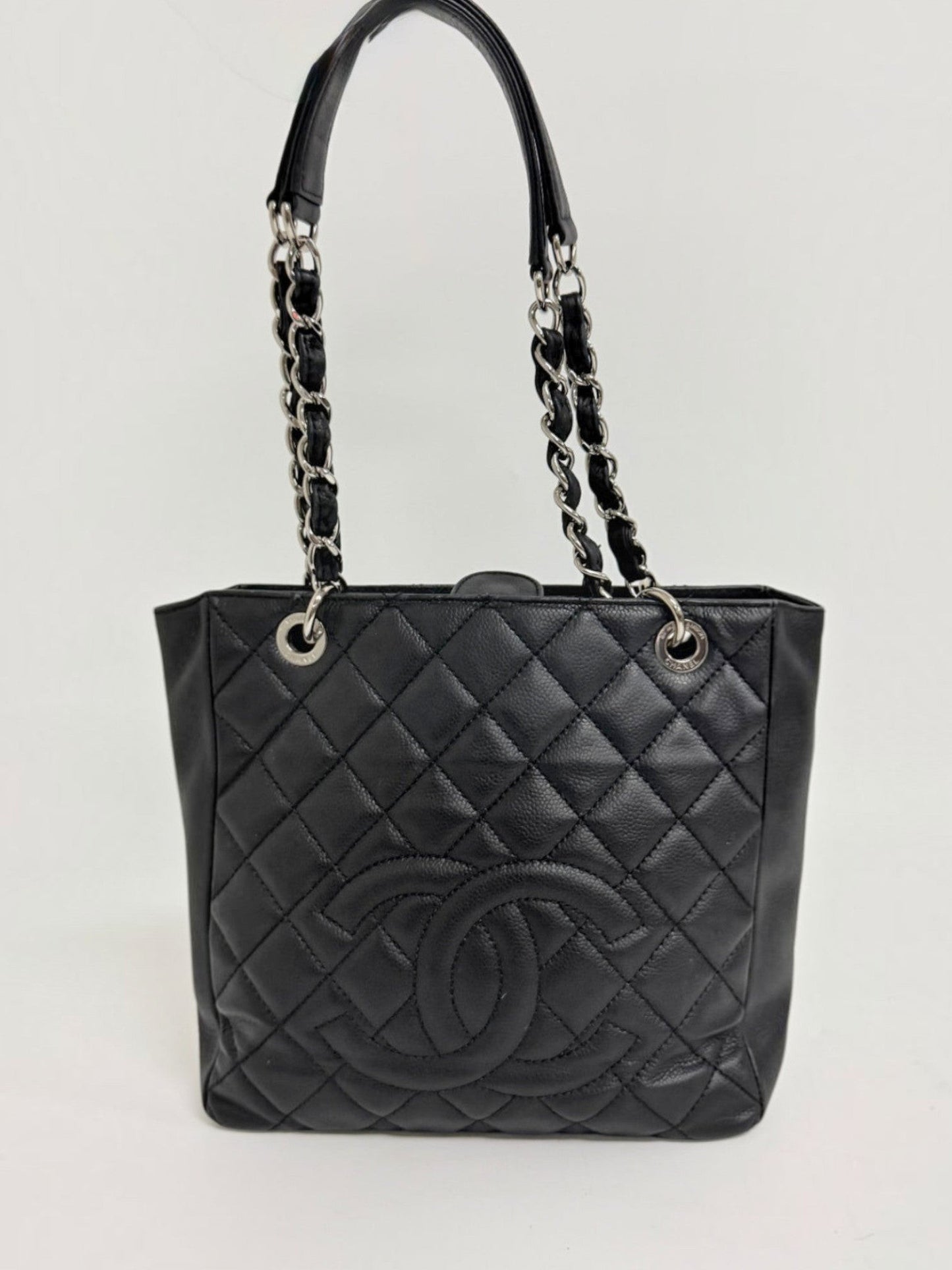 Lynn's Closet Boutique Chanel Petite Shopping Tote in black quilted caviar leather with silver chain shoulder straps.
