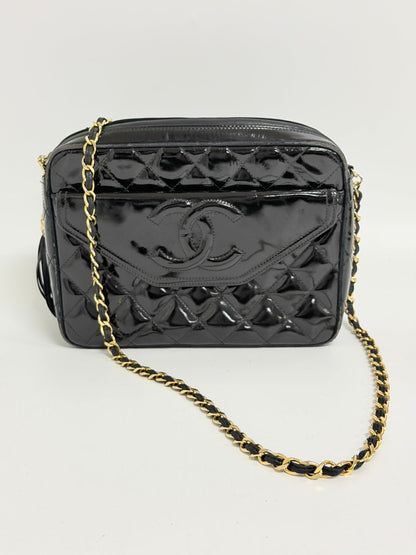 Lynn's Closet Boutique vintage black quilted patent leather Chanel camera bag with gold chain strap and CC logo