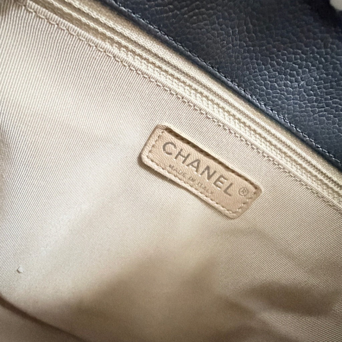Lynn's Closet Boutique Chanel Petite Shopping Tote interior beige fabric lining with leather brand logo tag