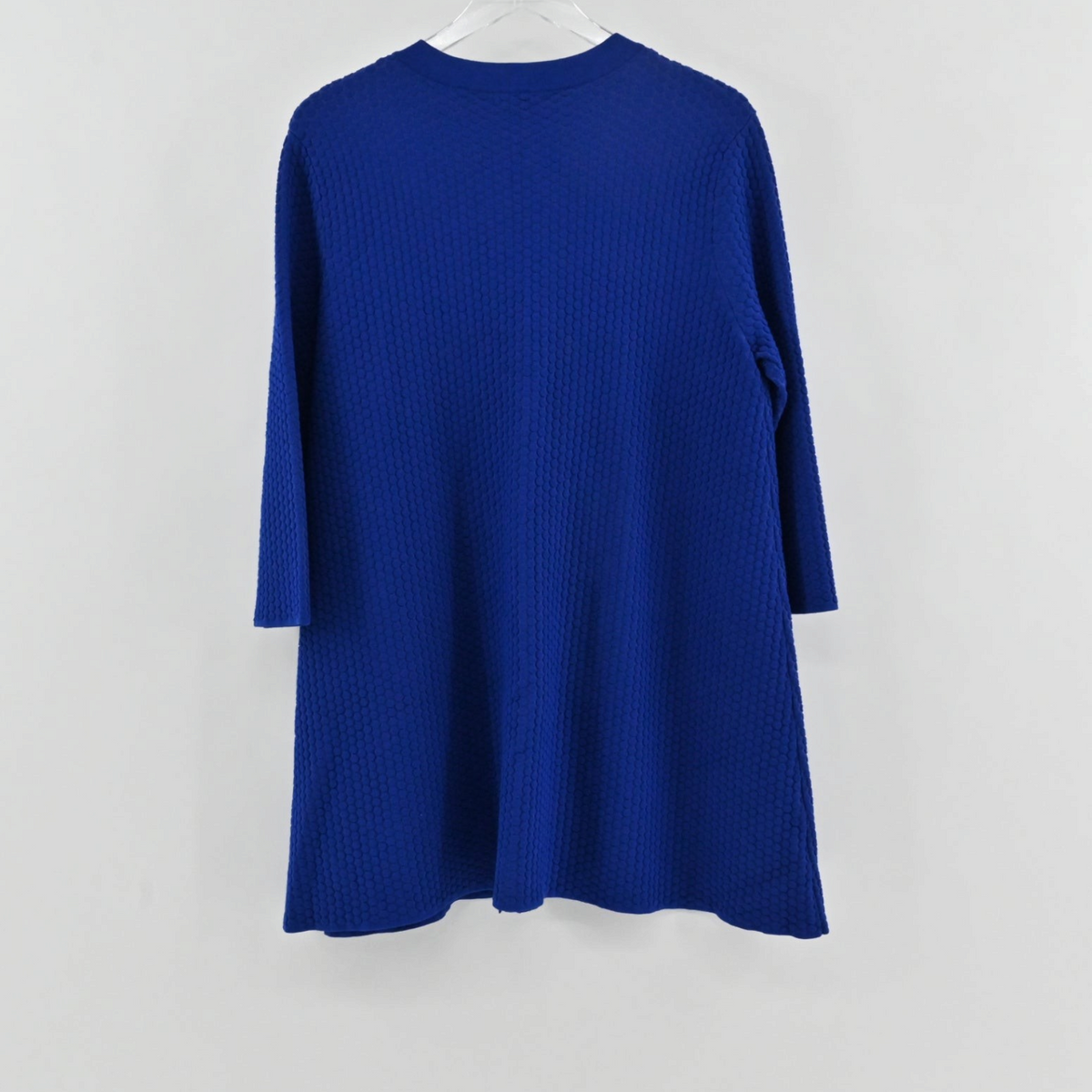 Lynn's Closet Boutique COS cobalt blue textured knit cardigan sweater, back view showing long sleeves and minimalist cut
