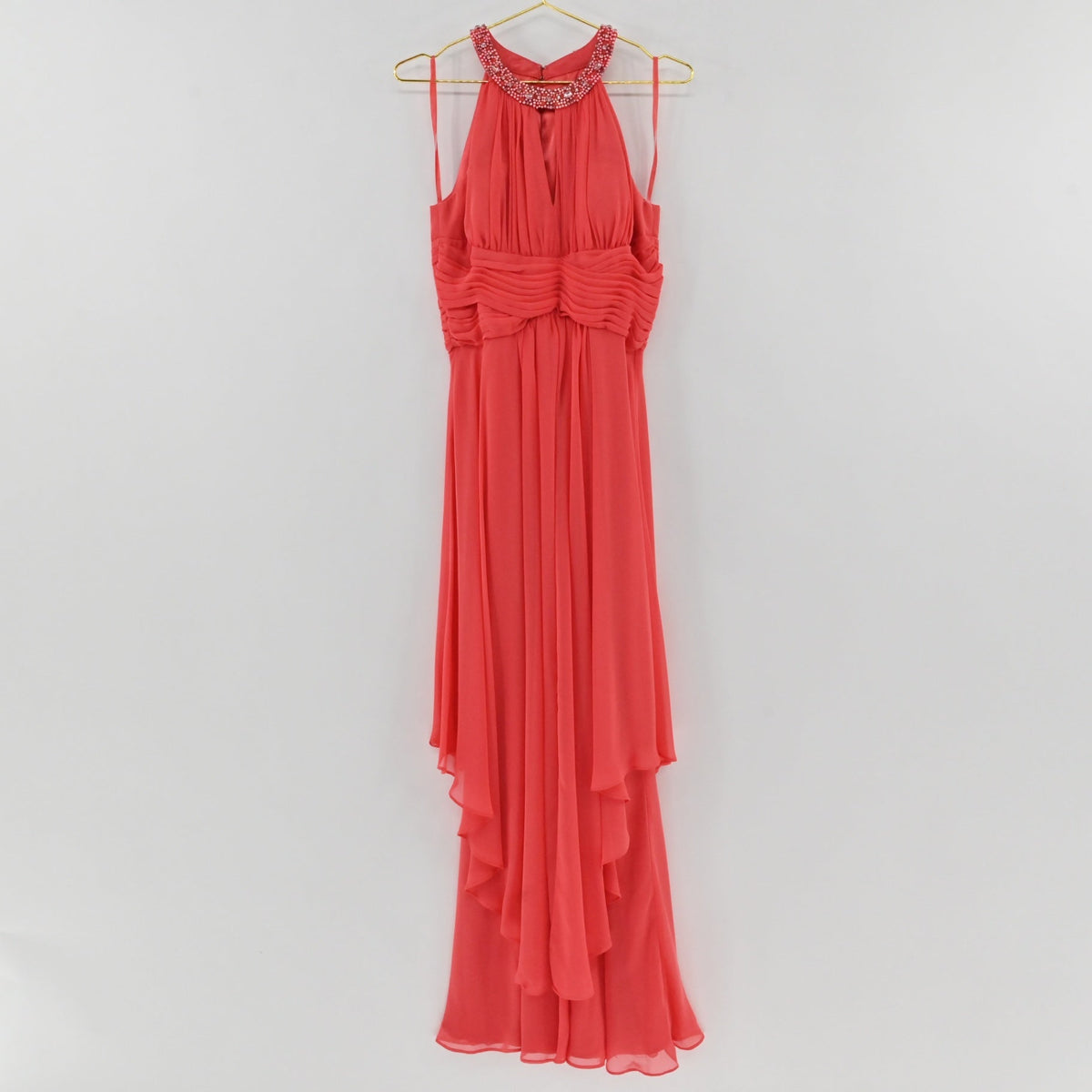 Lynn's Closet Boutique coral chiffon high-low halter dress with an embellished neckline and ruched bodice.
