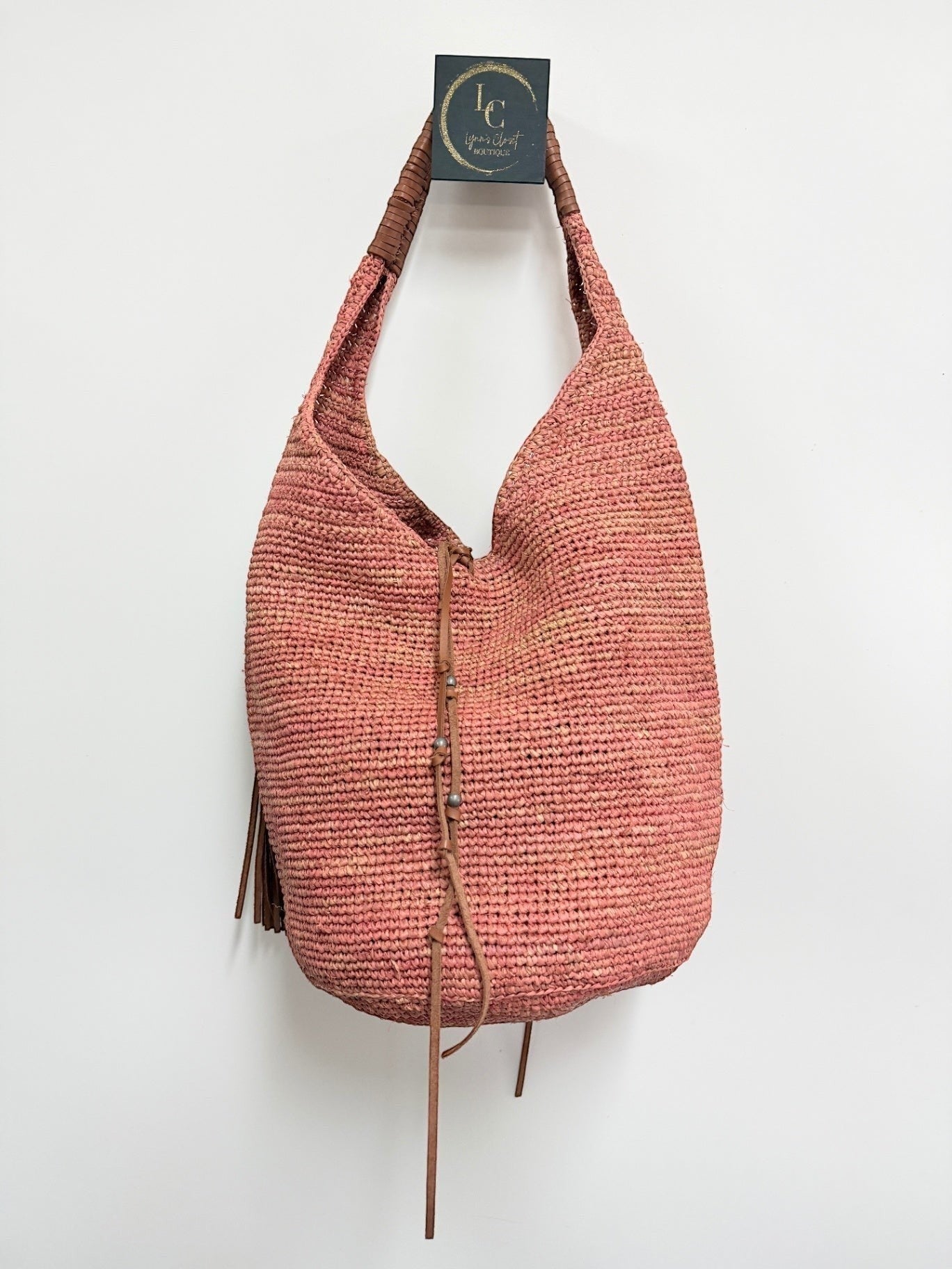 Lynn's Closet Boutique Polo Ralph Lauren coral raffia hobo bag with braided leather handle and tassel detail