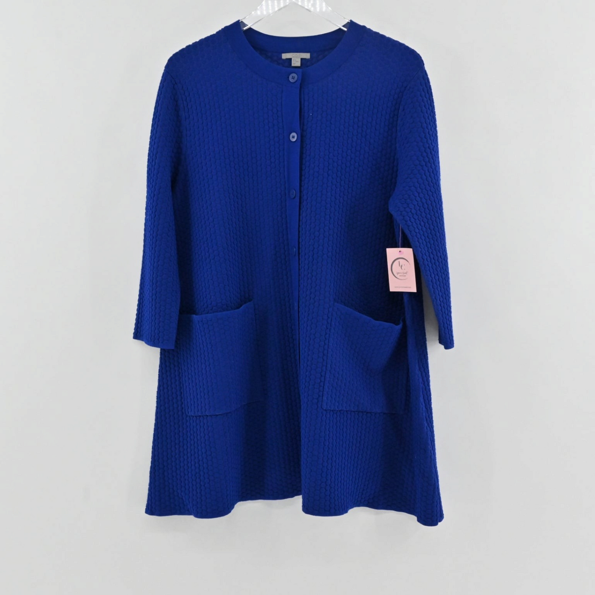 Lynn's Closet Boutique cobalt blue COS cardigan with a textured knit, button-front, and two front patch pockets.