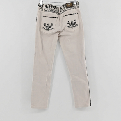Lynn's Closet Boutique cream Etro pants with intricate black embroidery on the waistband and back pockets.