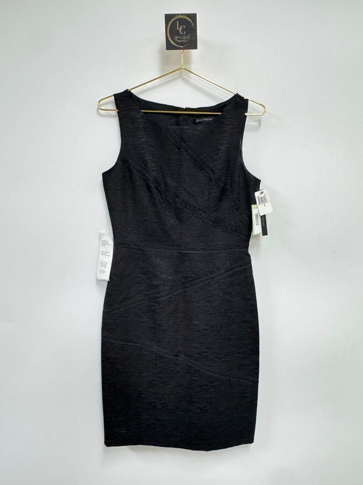 Lynn's Closet Boutique David Meister black sleeveless mini dress with textured diagonal seams and tags attached