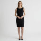 Lynn's Closet Boutique David Meister black sleeveless mini dress with textured diagonal seams on a model