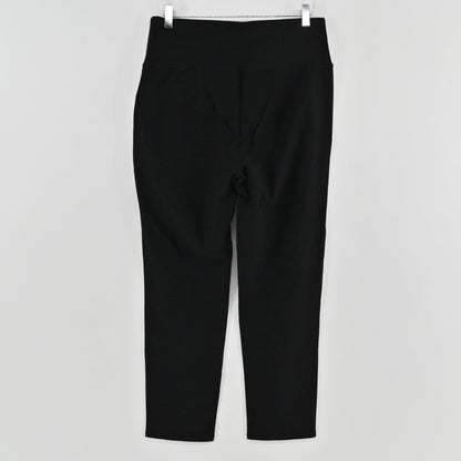 Lynn's Closet Boutique Eileen Fisher black high-waist slim-fit pants hanging against a plain white background.