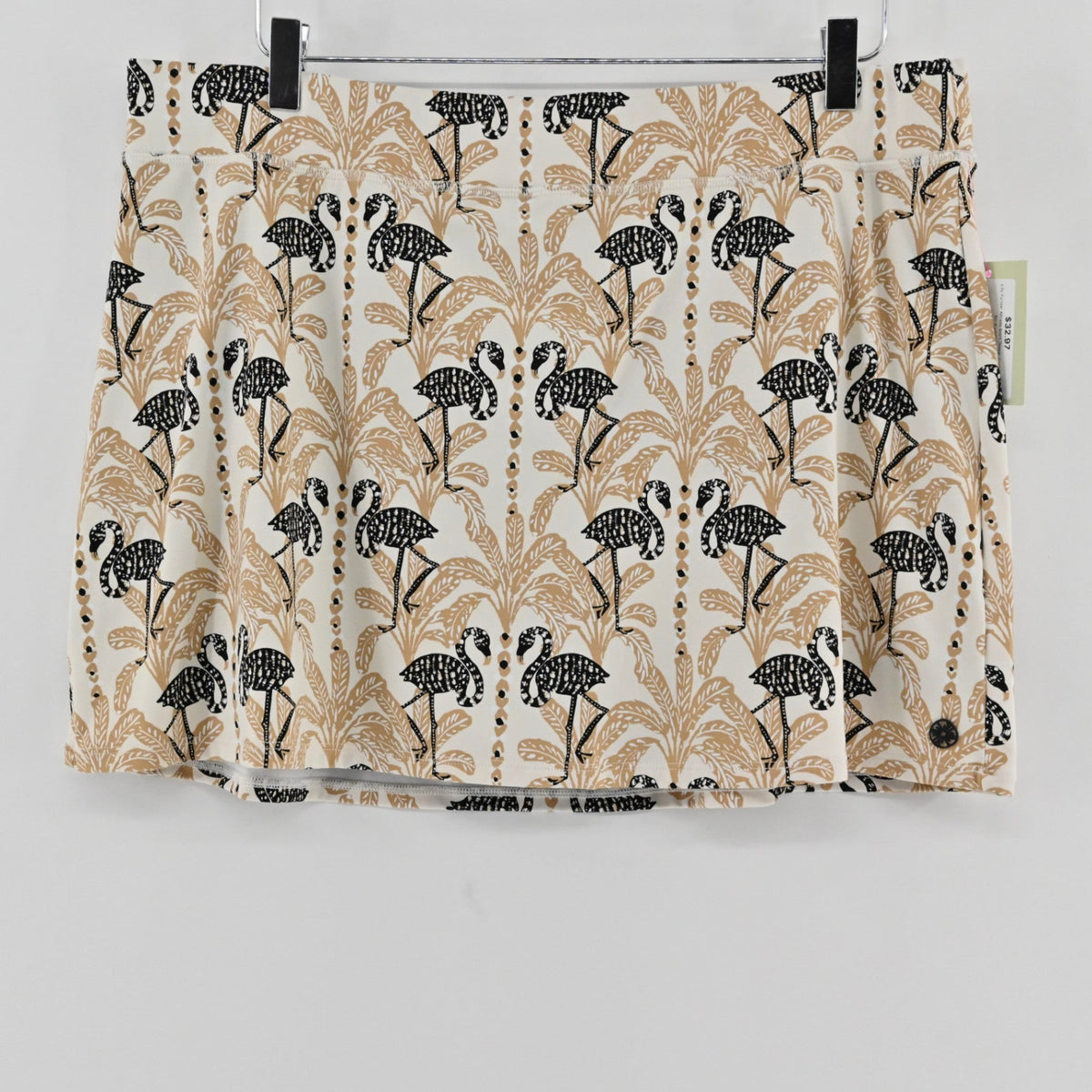 Lynn's Closet Boutique athletic skort in Deeper Coconut Lil Stir It Up print with black flamingos and palm trees.