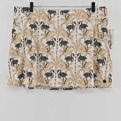 Lynn's Closet Boutique athletic skort in Deeper Coconut Lil Stir It Up print with black flamingos and palm trees.