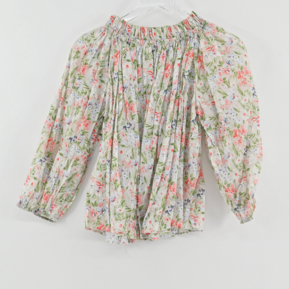 Lynn's Closet Boutique floral print smocked off-shoulder blouse with puff sleeves in a lightweight airy fabric.