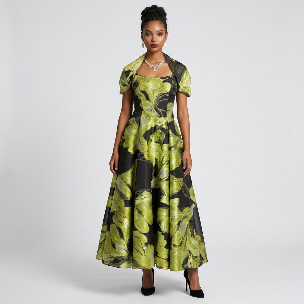 Lynn's Closet Boutique strapless A-line gown with black and lime green floral print and matching bolero wrap on model