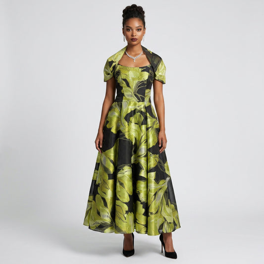 Lynn's Closet Boutique strapless A-line gown with black and lime green floral print and matching bolero wrap on model