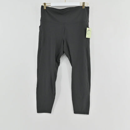 Lynn's Closet Boutique gray Lululemon high-rise Align leggings with side pockets hanging on a white background.